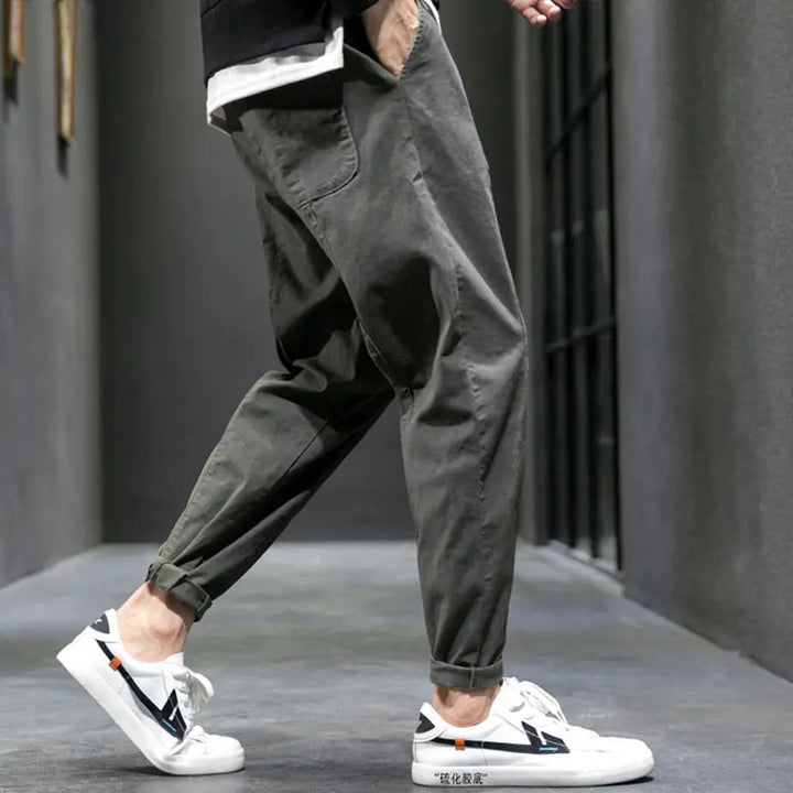 Stylish men's urban tapered joggers, featuring a modern fit and comfortable cotton blend for casual elegance.