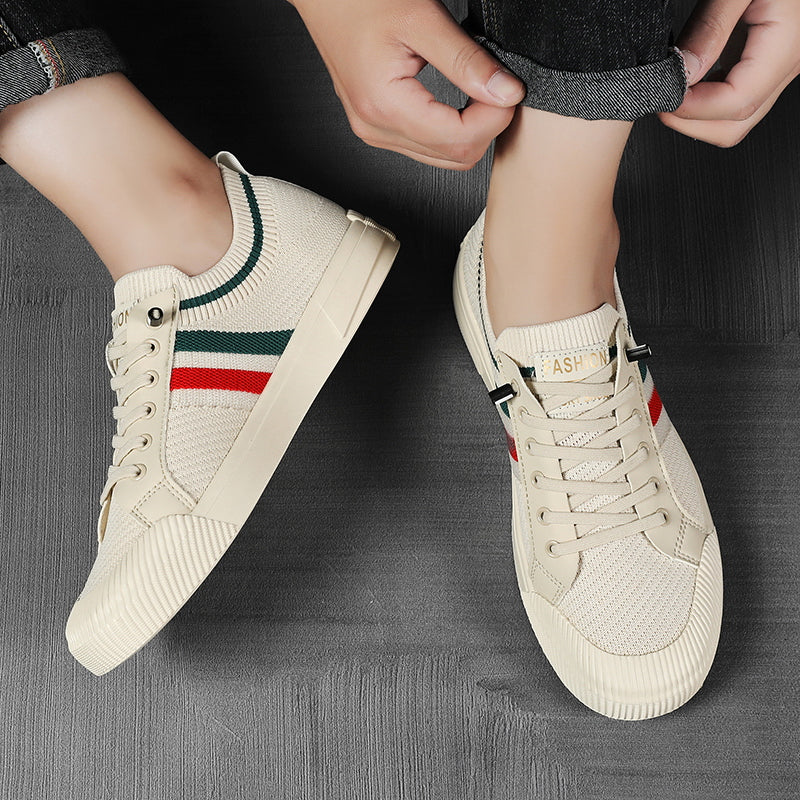 Side view of men's comfort walking sneakers. Urban style lace-up footwear, perfect for casual athletic wear.