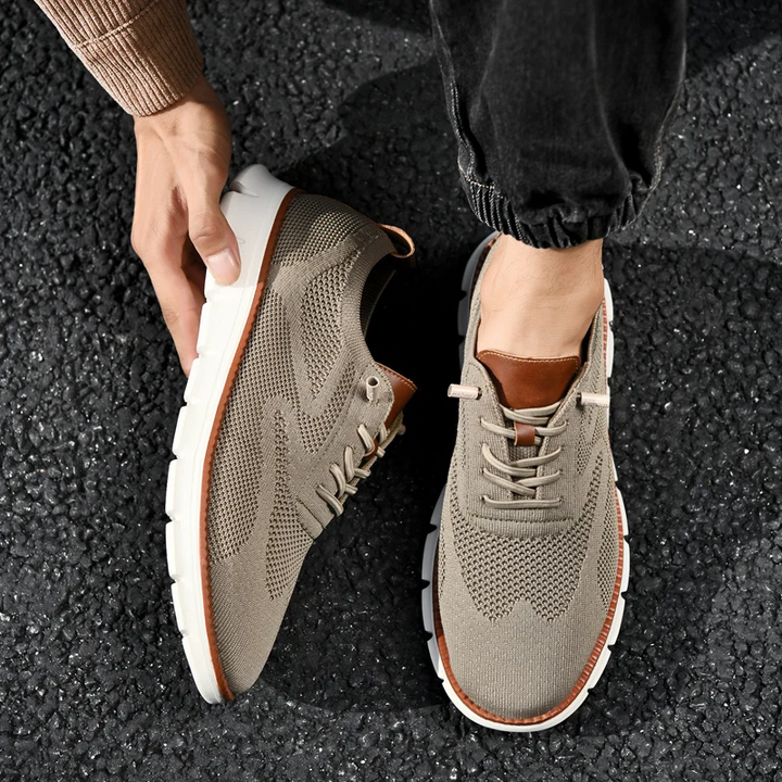 White UrbanFlex lightweight sneakers, versatile men's footwear for daily wear.