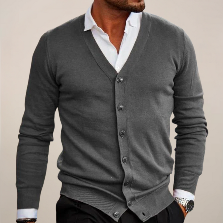 Close-up of a men's V-neck button cardigan, showcasing smart casual knitwear. Essential for fall layering.
