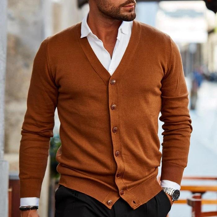 Close-up of a men's V-neck button cardigan, highlighting knitwear texture and long sleeves.