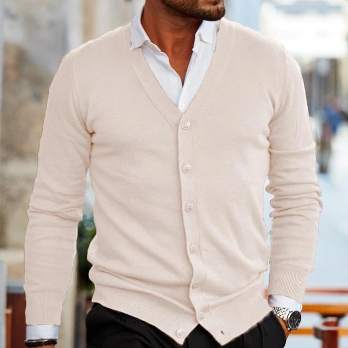 Side view of a man in a smart casual long sleeve knit cardigan, showcasing men's clothing and fit.