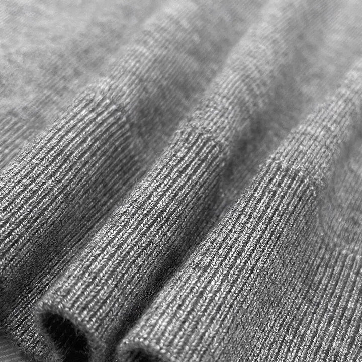 Comfortable and classic men's V-neck knit vest, a timeless choice for elegant layering in office or casual settings.