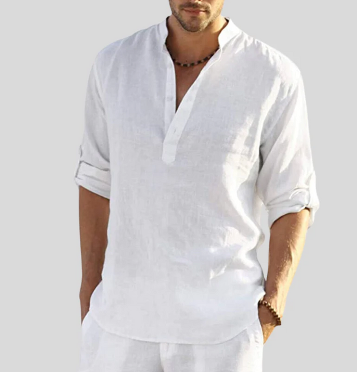 Relaxed fit men's V-neck short sleeve button-up shirt. Lightweight fabric offers comfortable everyday summer style.