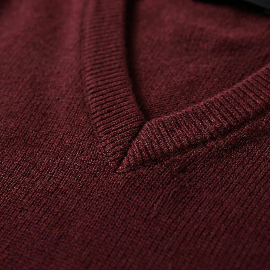 Classic men's knit V-neck vest. Ideal sleeveless layering piece for a refined, comfortable, polished men's fashion style.