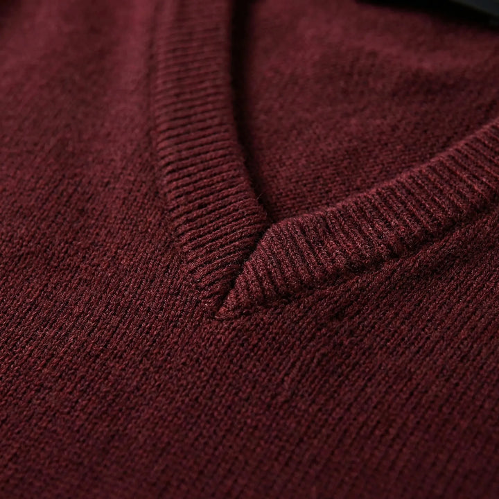 Classic men's knit V-neck vest. Ideal sleeveless layering piece for a refined, comfortable, polished men's fashion style.