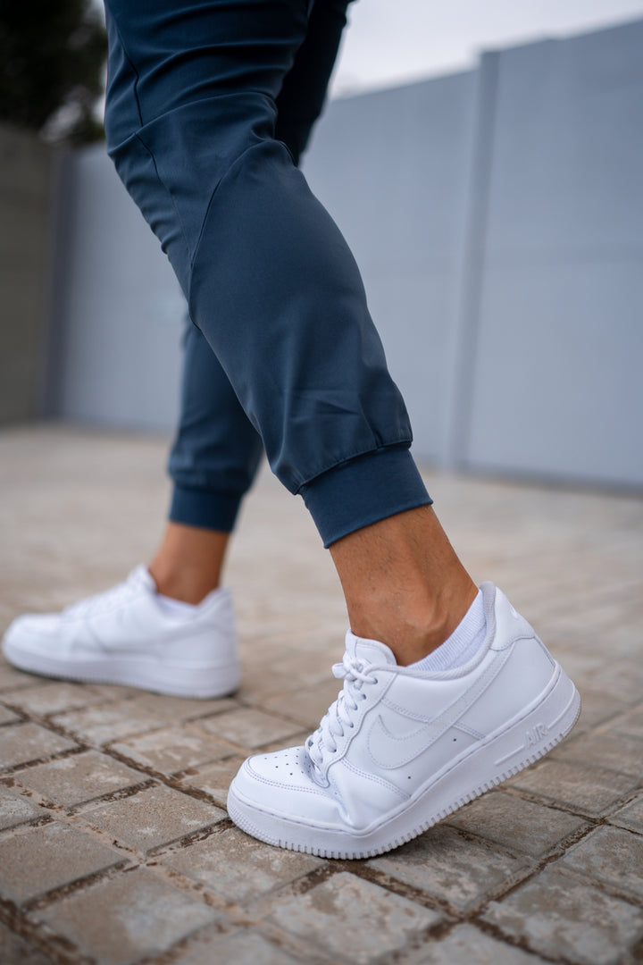Grey Valenza men's joggers, quick-dry performance fabric, active lifestyle.