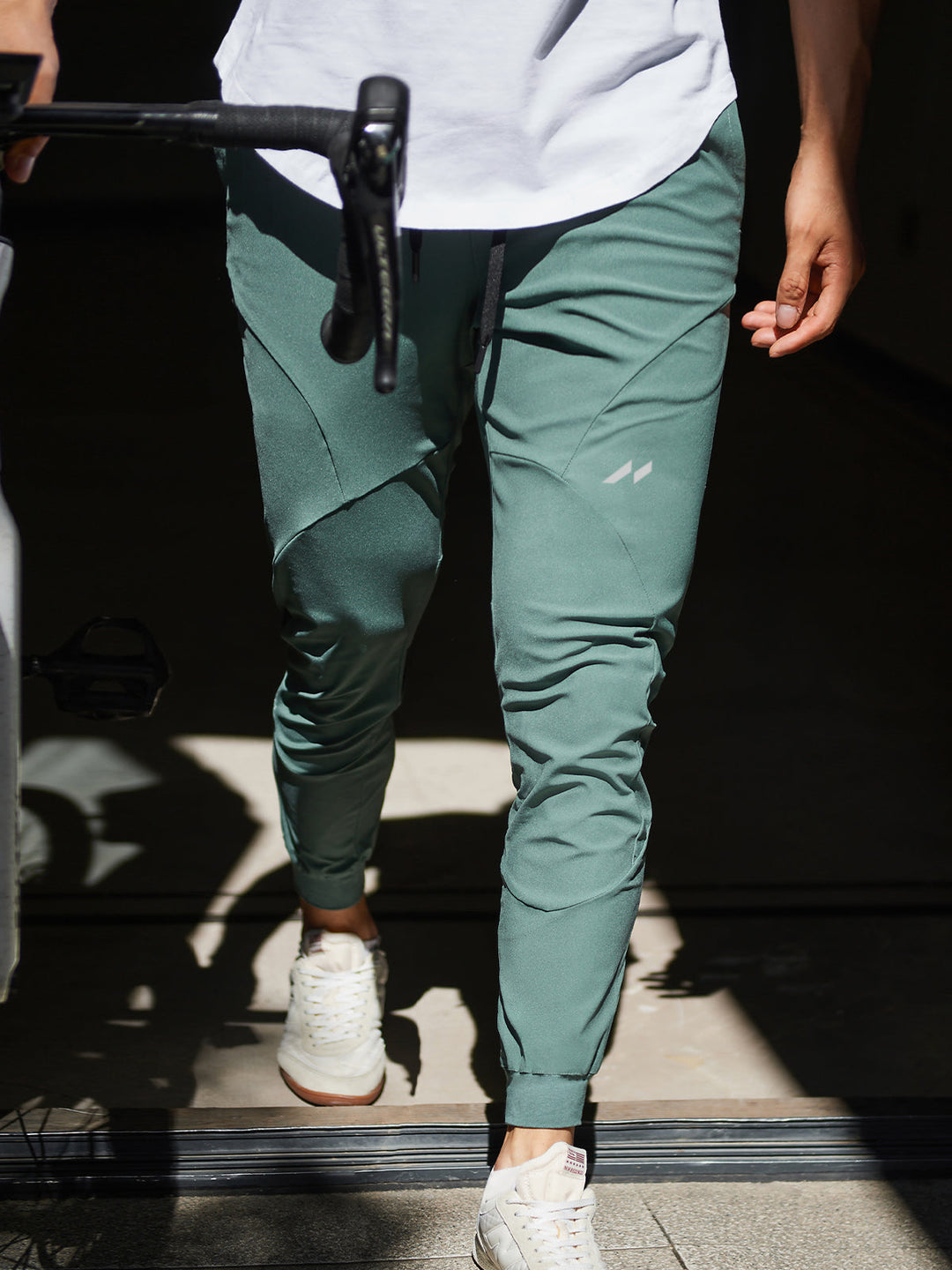 Black Valenza men's joggers, tapered leg, for athletic performance & comfort.