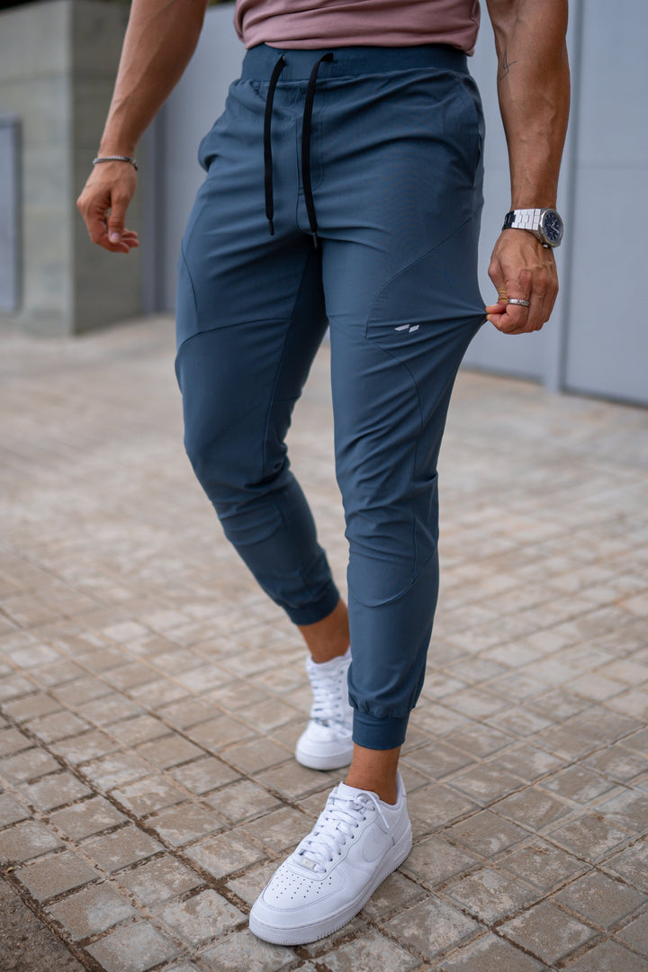 Black Valenza men's tapered leg joggers, athletic fit, for gym & casual wear.
