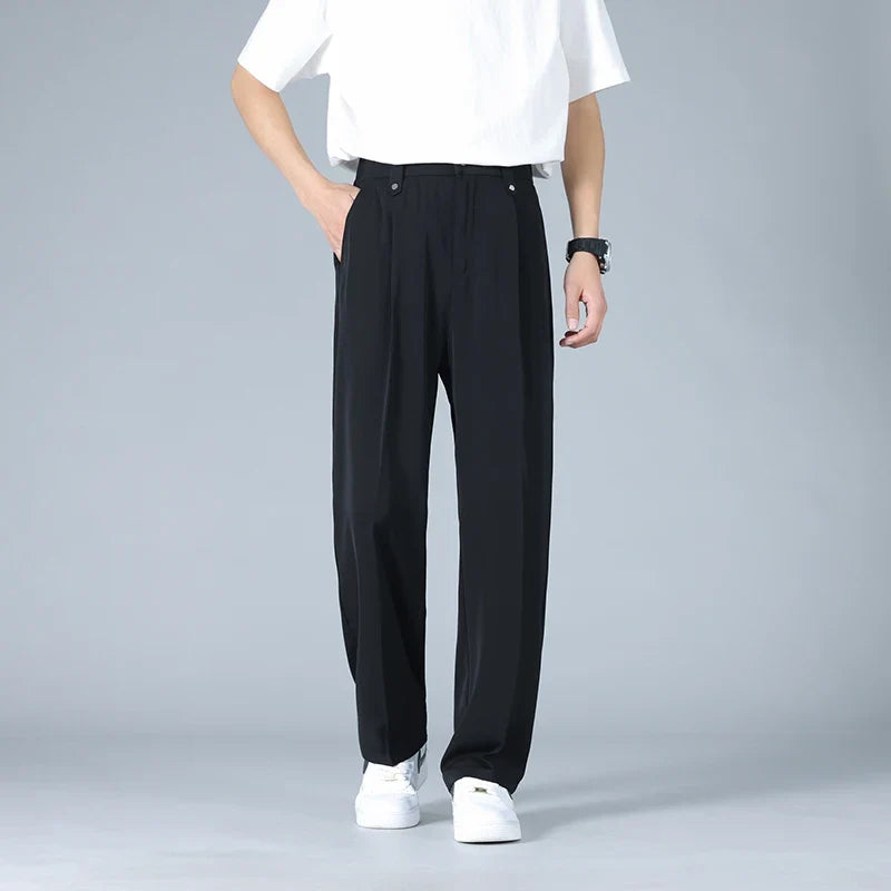 Modern men's dress trousers, Vallier relaxed fit with elegant pleated front, ideal for office or casual.