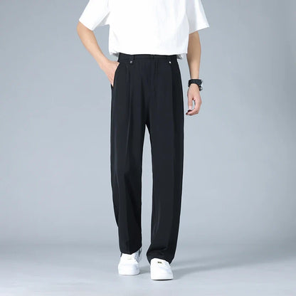 Modern men's dress trousers, Vallier relaxed fit with elegant pleated front, ideal for office or casual.