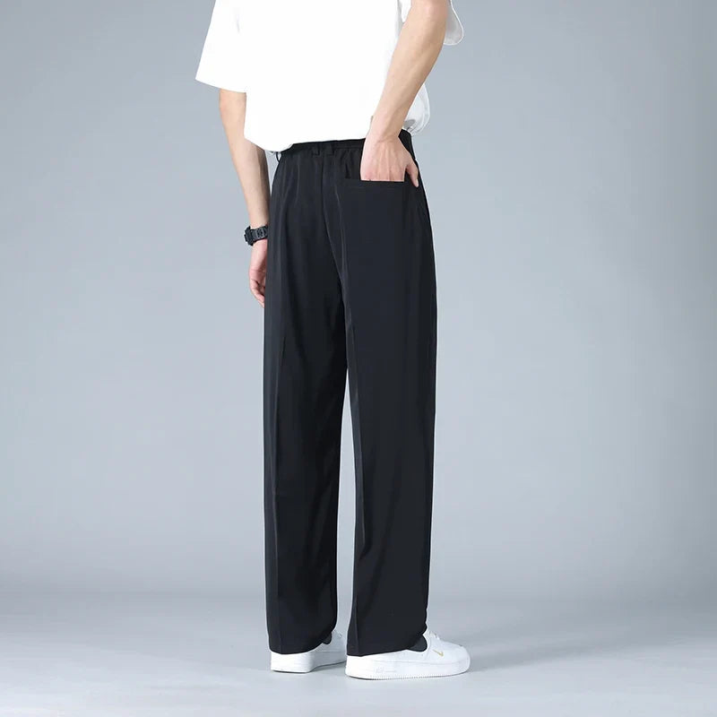 Comfortable Vallier men's pleated front dress pants, relaxed fit, perfect for versatile workwear & modern men.