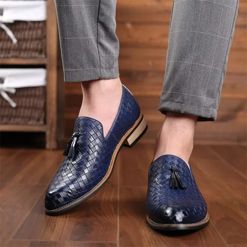 Detailed view of men's Valtieri woven tassel loafers. Elegant texture & classic design.