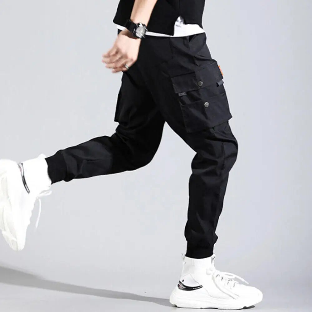 Stealth black men's Velocity Cargo Joggers. Ultimate comfort & modern streetwear style with tapered fit.