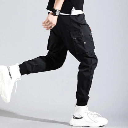 Stealth black men's Velocity Cargo Joggers. Ultimate comfort & modern streetwear style with tapered fit.