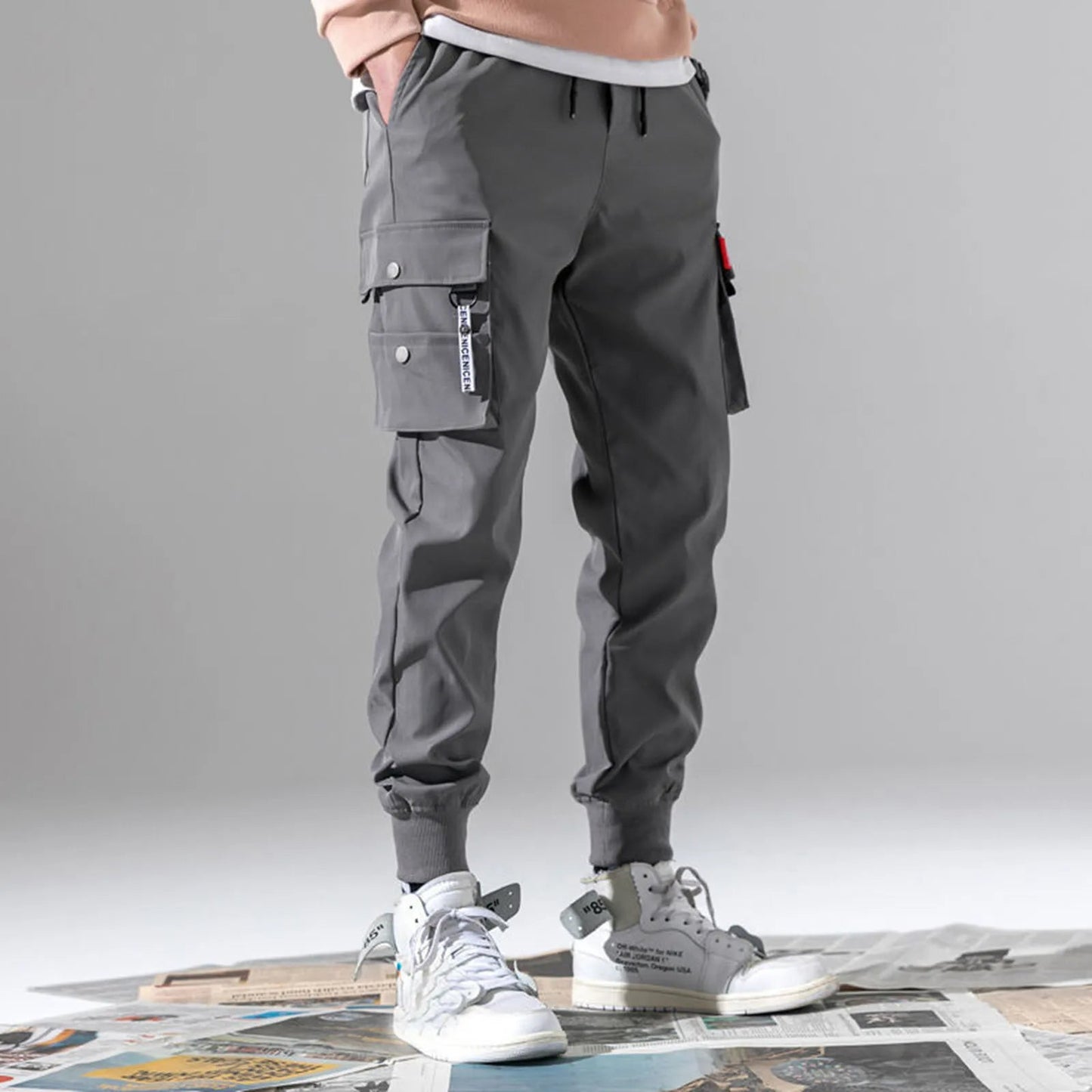 Comfortable men's Velocity Jogger in storm gray. Tapered design for modern casual or athletic wear.