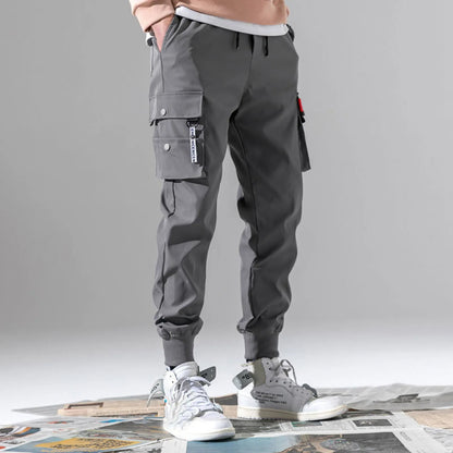 Comfortable men's Velocity Jogger in storm gray. Tapered design for modern casual or athletic wear.