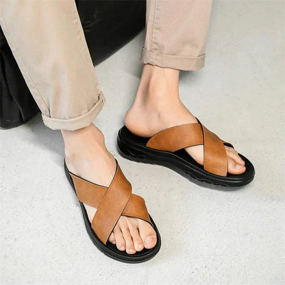 Dark brown Venturo men's cross-strap sandals, durable non-slip sole for outdoor and everyday comfort.