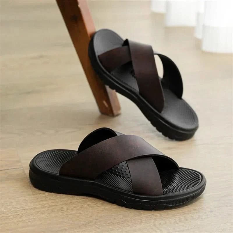 Light brown Venturo men's comfort sandals, stylish cross-strap design for casual summer fashion.