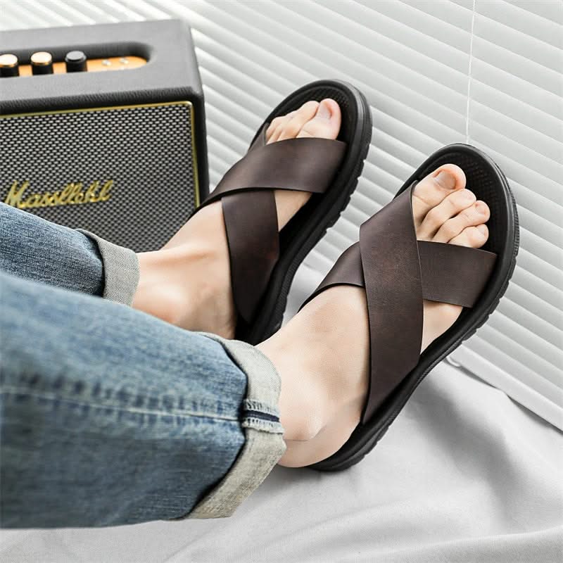 Black Venturo men's everyday comfort sandals featuring a cross-strap design and padded insole.
