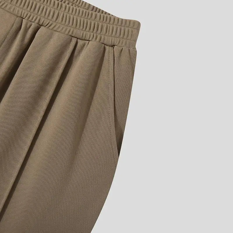 Back view of Men's Verona Classic Pleated Trousers. Showing tailored fit & classic design details.
