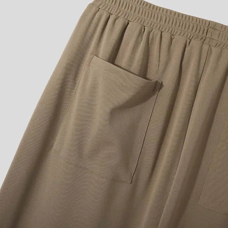 Side profile of Men's Verona Classic Pleated Trousers. Highlighting sleek tailored fit & comfort.