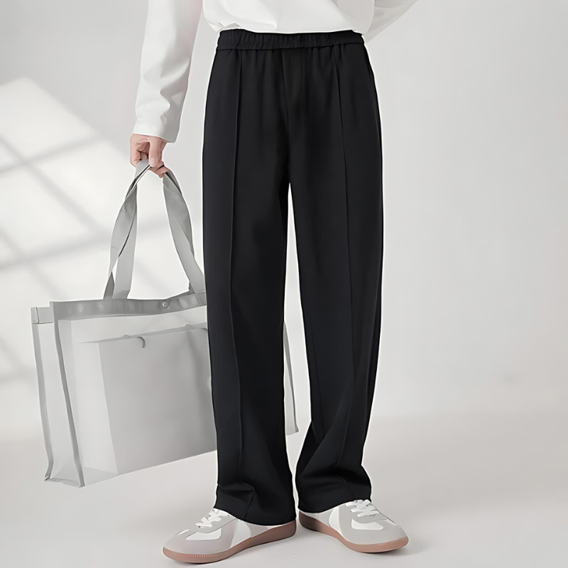 Close-up of pleats on Men's Verona Classic Trousers. Showing tailored front detail on quality men's pants.