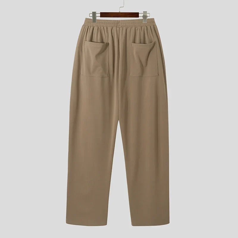 Full length view of Men's Verona Classic Pleated Trousers. Classic khaki dress pants for men.