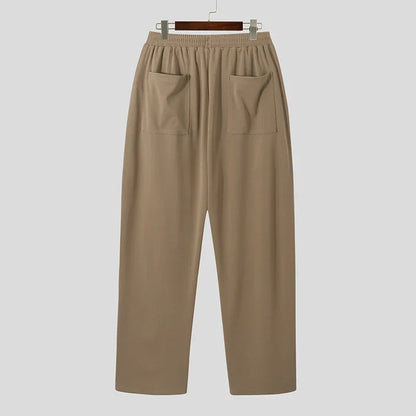 Full length view of Men's Verona Classic Pleated Trousers. Classic khaki dress pants for men.