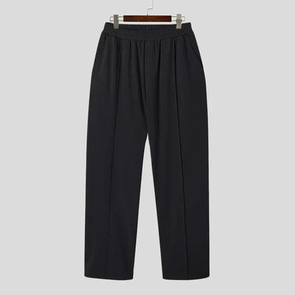 Elegant Men's Black Verona Classic Pleated Trousers. Dress pants for a sophisticated tailored men's look.
