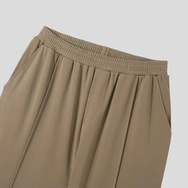 Fabric texture of Men's Verona Classic Pleated Trousers. High-quality material for comfort & style in men's pants.