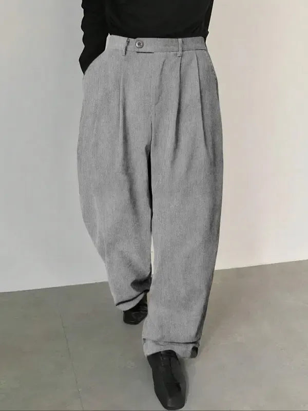 Stylish men's tailored pleated trousers, perfect for workwear or smart casual occasions.