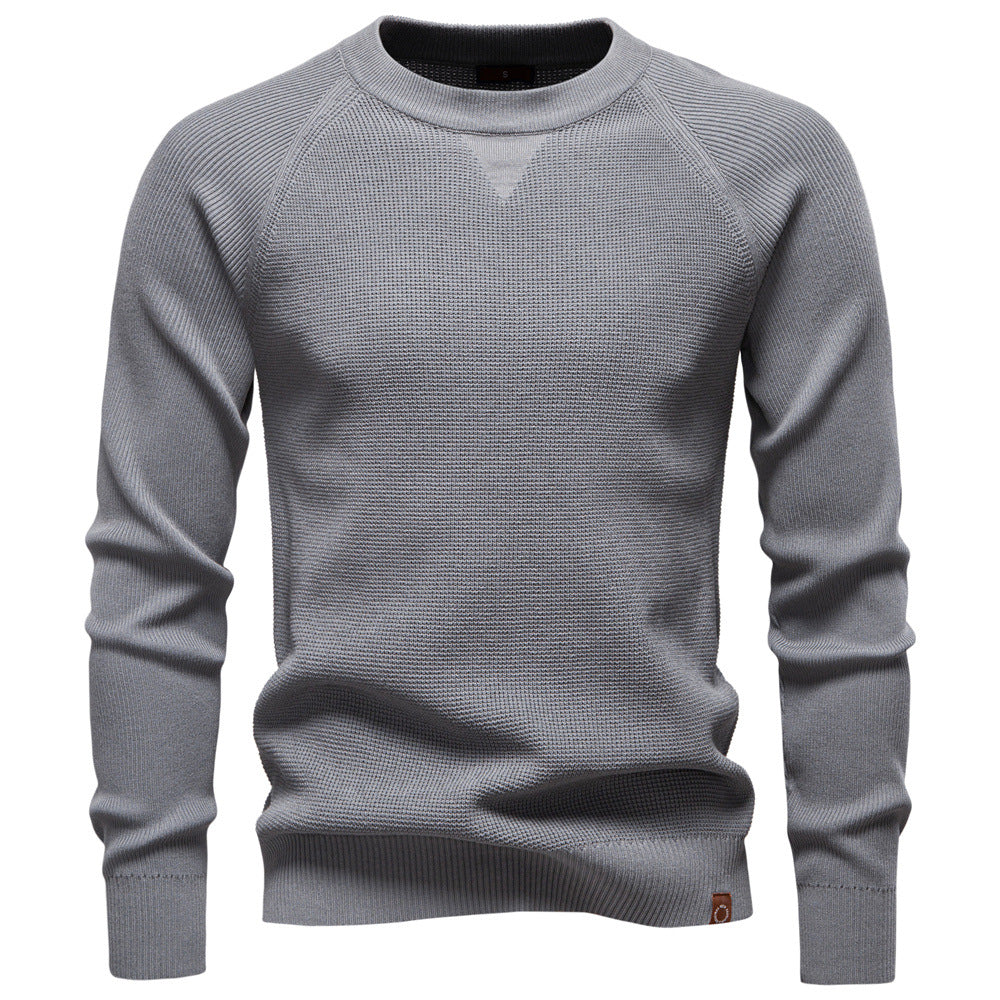 Textured waffle knit men's sweater, long sleeve, crew neck, offering cozy comfort and style.