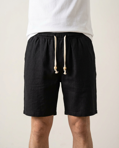 Black men's versatile athletic shorts, featuring a comfortable relaxed fit and adjustable drawstring for all-day wear.