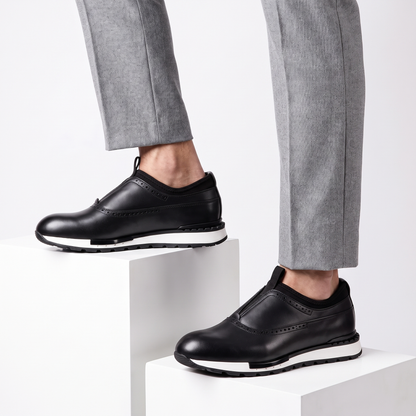 Men's versatile black slip-on dress shoes, ideal for work, office, or casual everyday comfort. Stylish loafers.