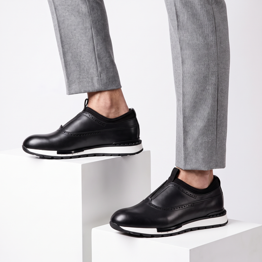 Men's versatile black slip-on dress shoes, ideal for work, office, or casual everyday comfort. Stylish loafers.