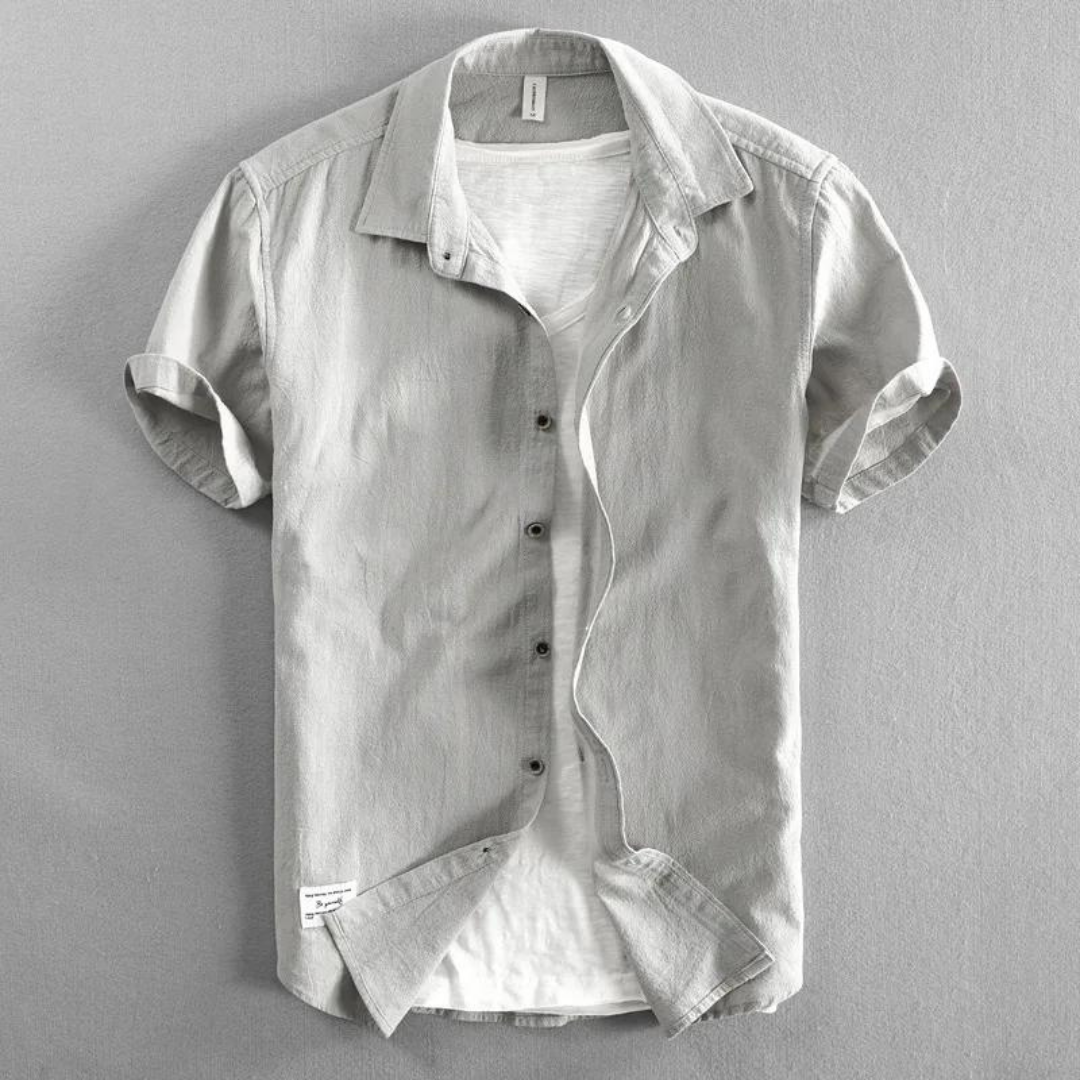 Classic men's button-up shirt, breathable and comfortable for everyday wear. Ideal versatile top for spring & summer.