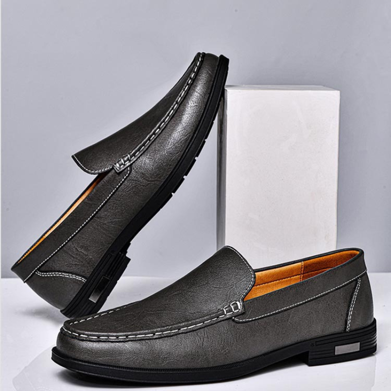 Men's brown slip-on loafers, versatile for casual, smart-casual, and everyday wear.
