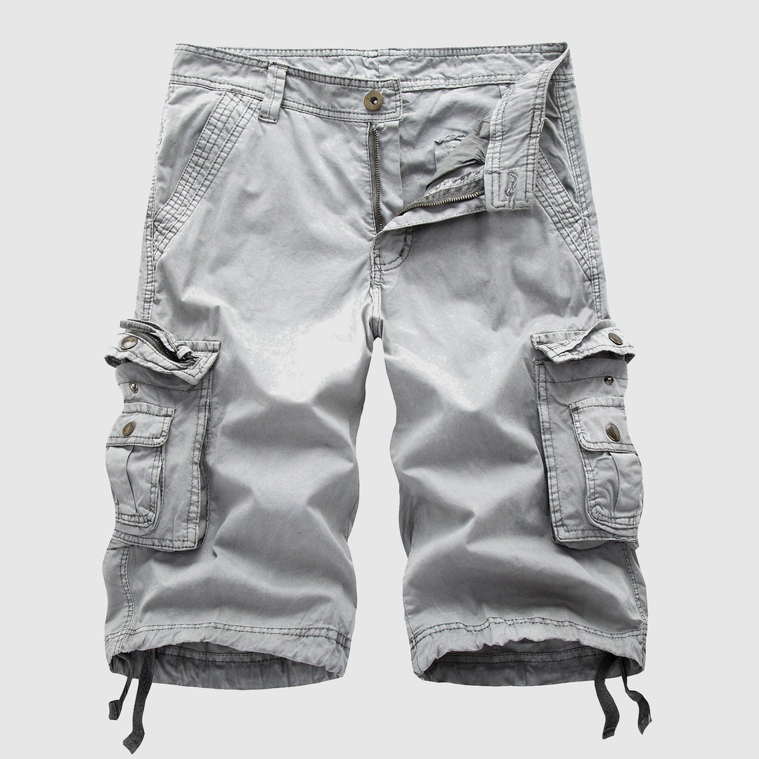 Rugged men's outdoor cargo shorts, multi-pocket design, adjustable hem for hiking & adventure wear.