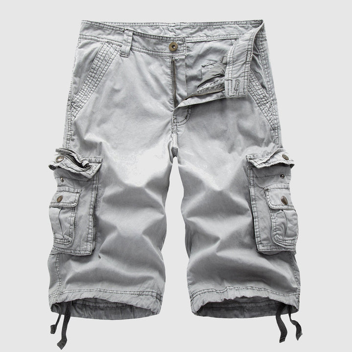 Rugged men's outdoor cargo shorts, multi-pocket design, adjustable hem for hiking & adventure wear.