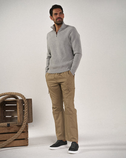 Back view of men's relaxed fit cargo pants, showing practical back pockets for everyday utility & comfortable style.