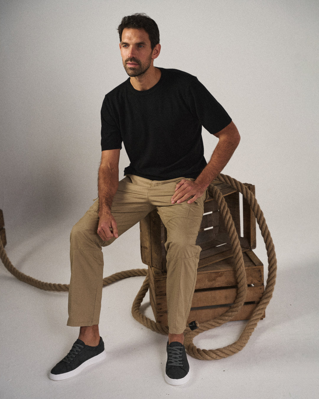 Close-up of multi-pocket design on men's cargo pants, showcasing practical utility and versatile everyday storage.