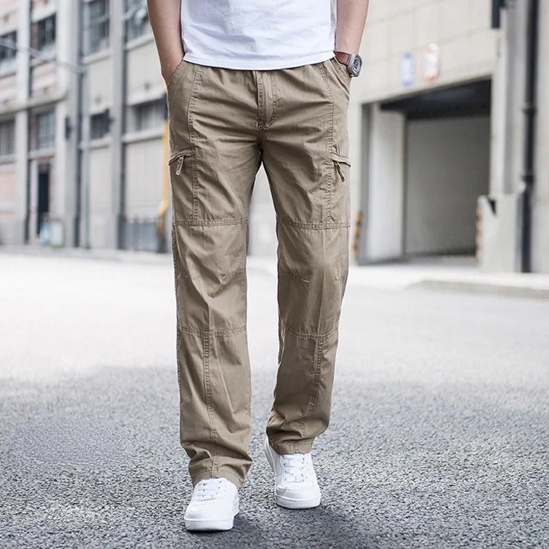 Detail of comfortable waistband on men's relaxed fit cargo pants, ensuring everyday comfort & practical style.