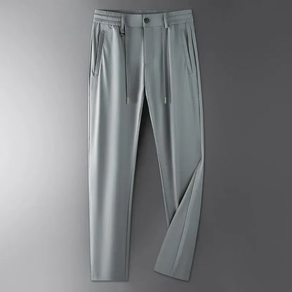 Men's Versatile Comfort Trousers, perfect for everyday style & travel. Easy-care modern fit pants with drawstring waist.