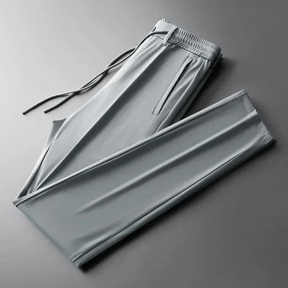Versatile men's comfort pants, ideal for travel & everyday wear. Modern fit trousers with drawstring waist & easy care.