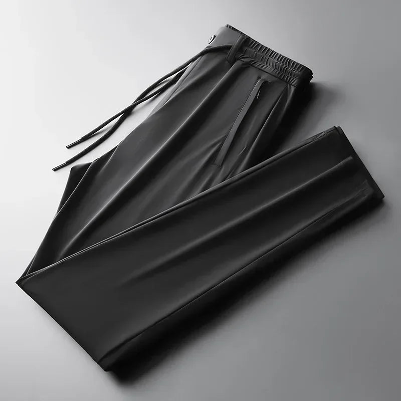 Easy-care men's comfort trousers for versatile travel & everyday style. Modern fit pants with a comfortable drawstring waist.