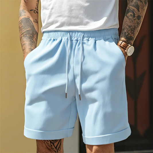 Men's versatile cuffed shorts, perfect for summer casual wear. Features elastic waist & drawstring for comfort.