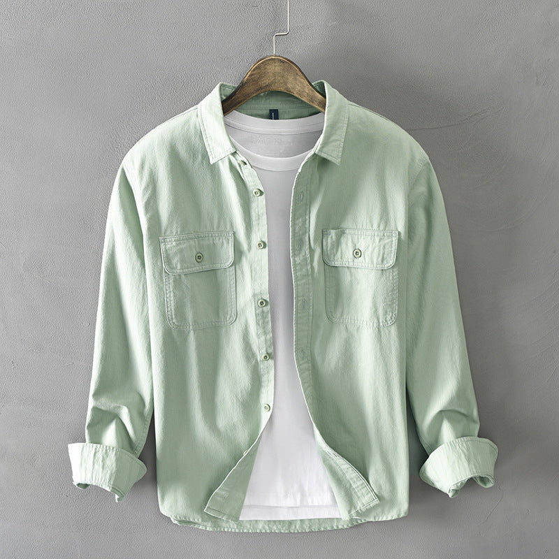 Versatile men's long-sleeve casual shirt with button-down collar and practical flap pockets for any occasion.
