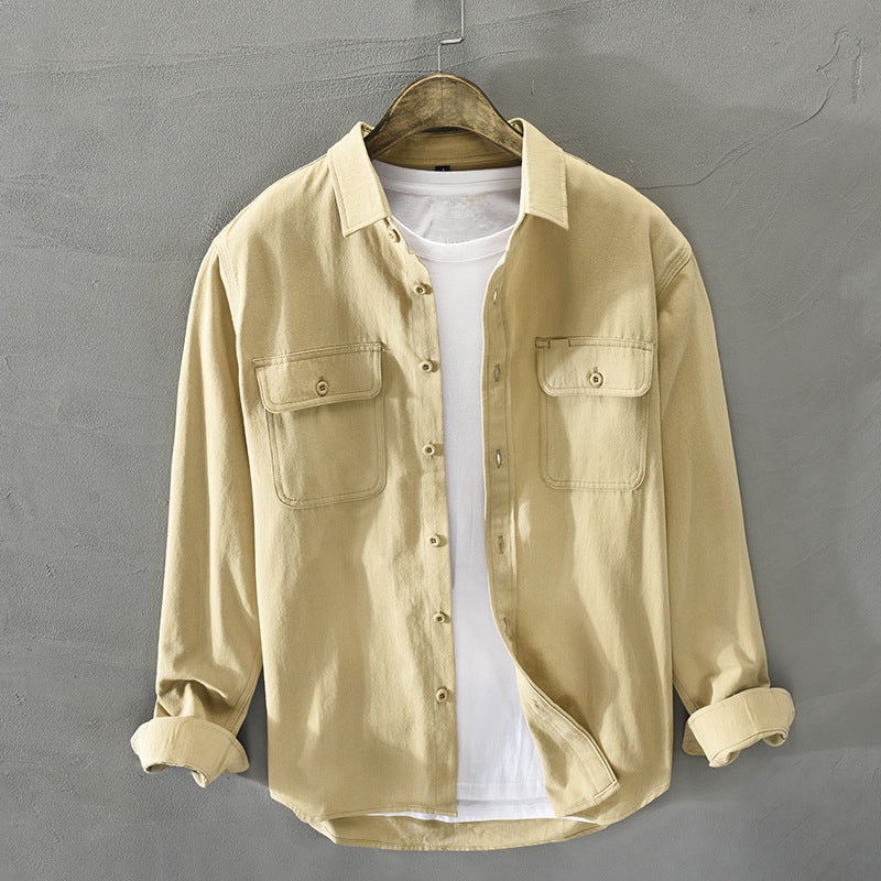Stylish men's button-down shirt with two flap pockets, a classic long-sleeve design for men's fashion.
