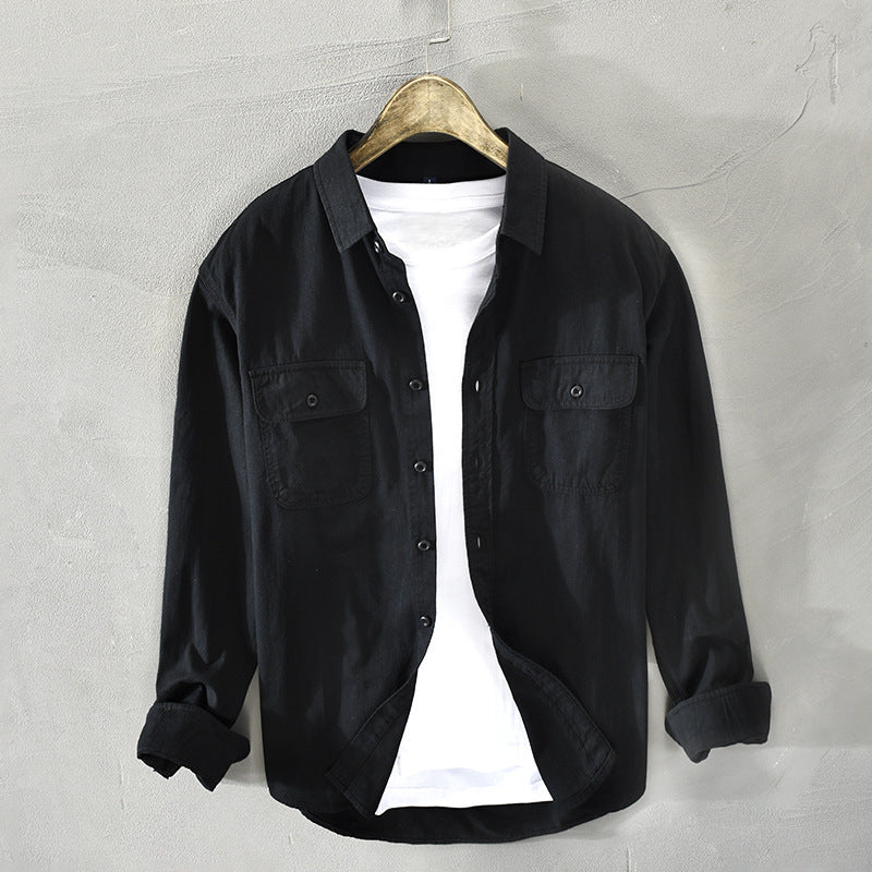Comfortable men's everyday button-down shirt, long sleeve, featuring chest flap pockets for a relaxed look.